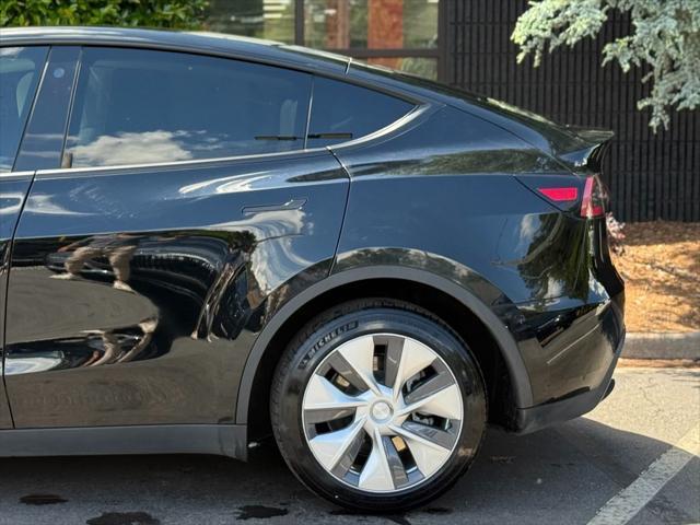 used 2023 Tesla Model Y car, priced at $30,985