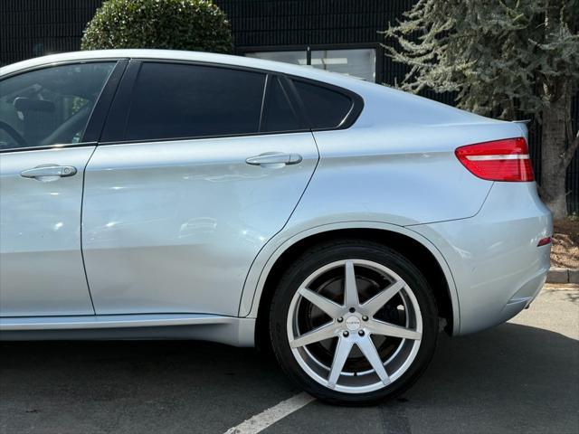 used 2012 BMW X6 M car, priced at $16,985