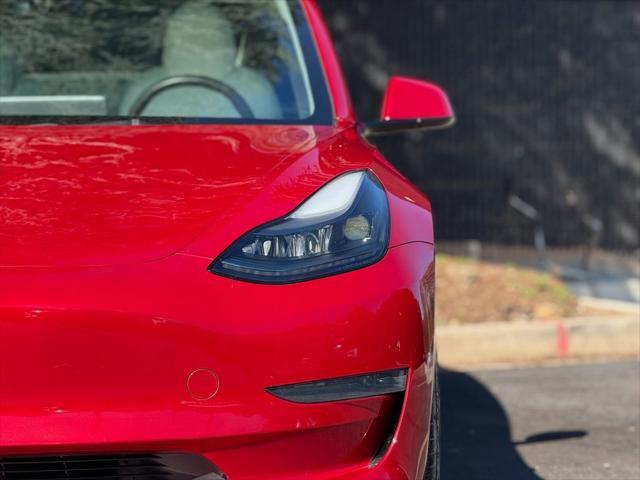 used 2023 Tesla Model 3 car, priced at $25,985