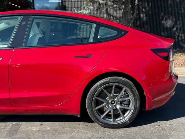 used 2023 Tesla Model 3 car, priced at $25,985