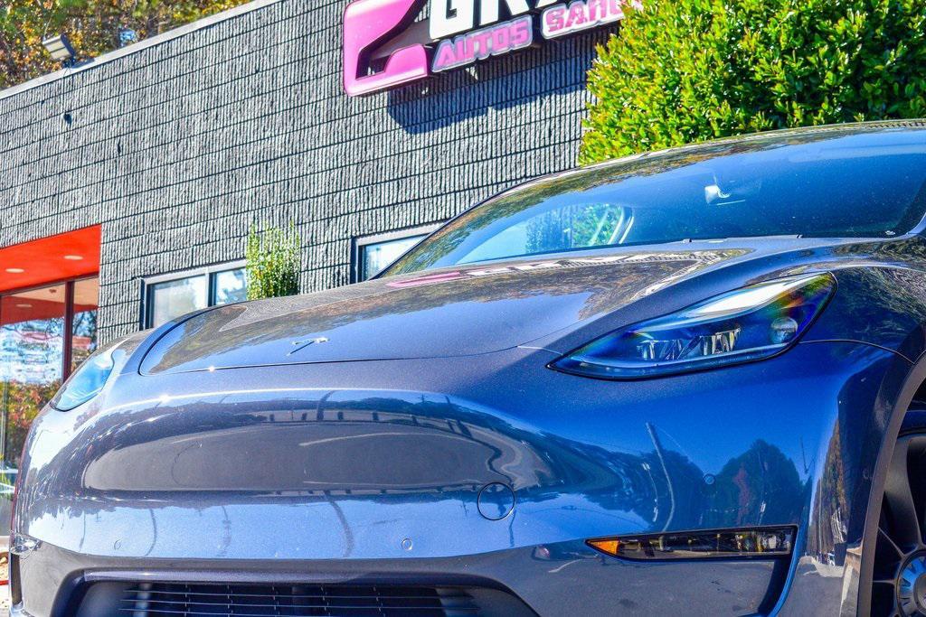 used 2022 Tesla Model Y car, priced at $27,895