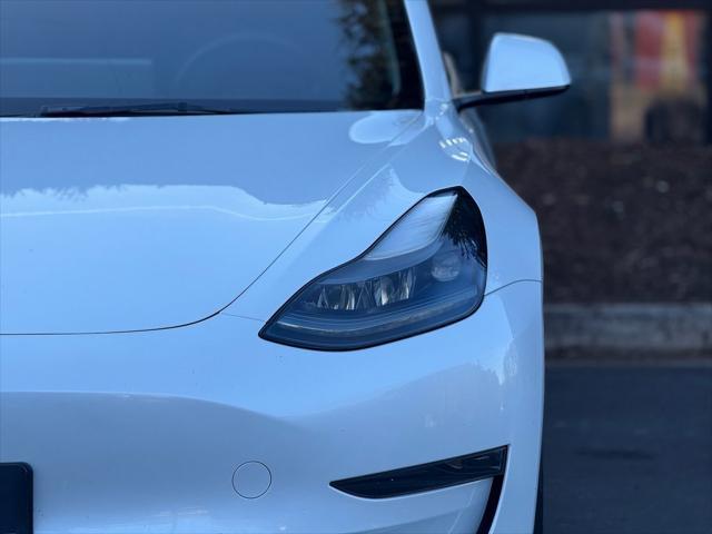 used 2023 Tesla Model 3 car, priced at $27,895