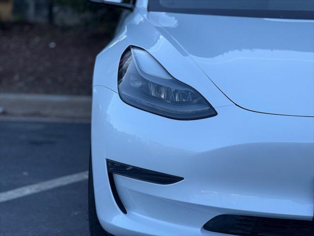 used 2023 Tesla Model 3 car, priced at $27,895