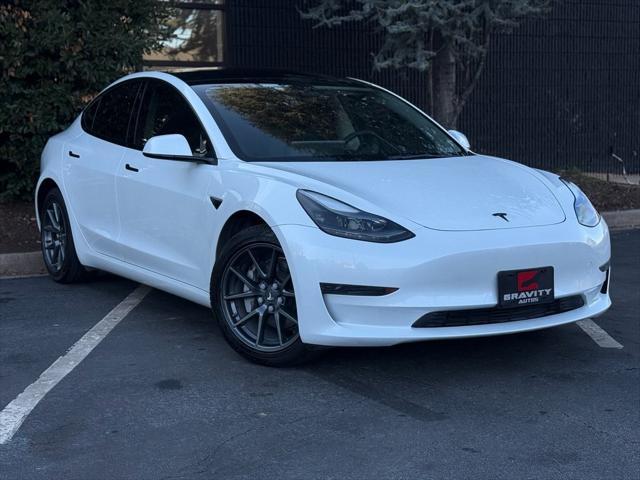 used 2023 Tesla Model 3 car, priced at $27,895