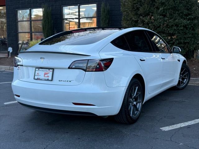 used 2023 Tesla Model 3 car, priced at $27,895