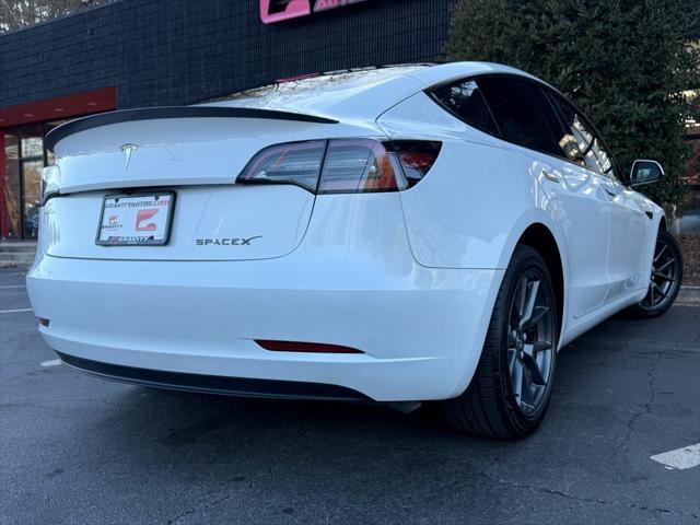 used 2023 Tesla Model 3 car, priced at $27,895