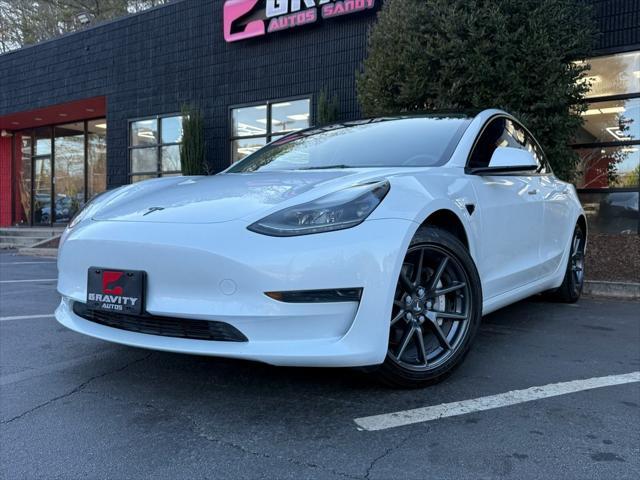 used 2023 Tesla Model 3 car, priced at $27,895