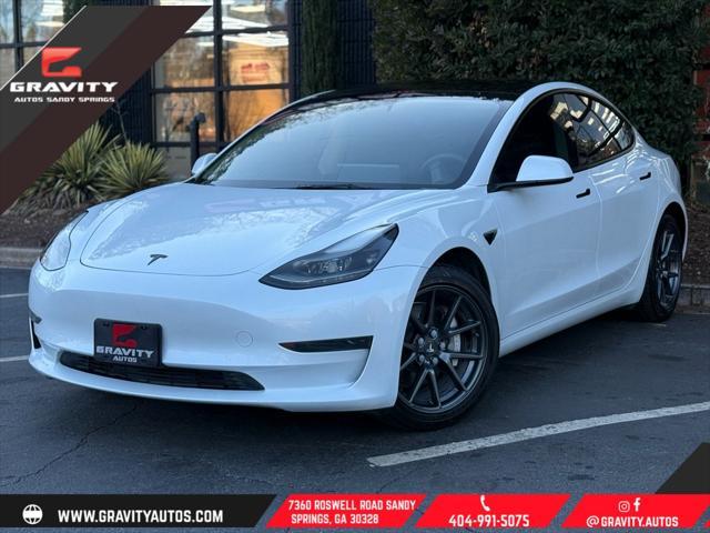 used 2023 Tesla Model 3 car, priced at $27,895