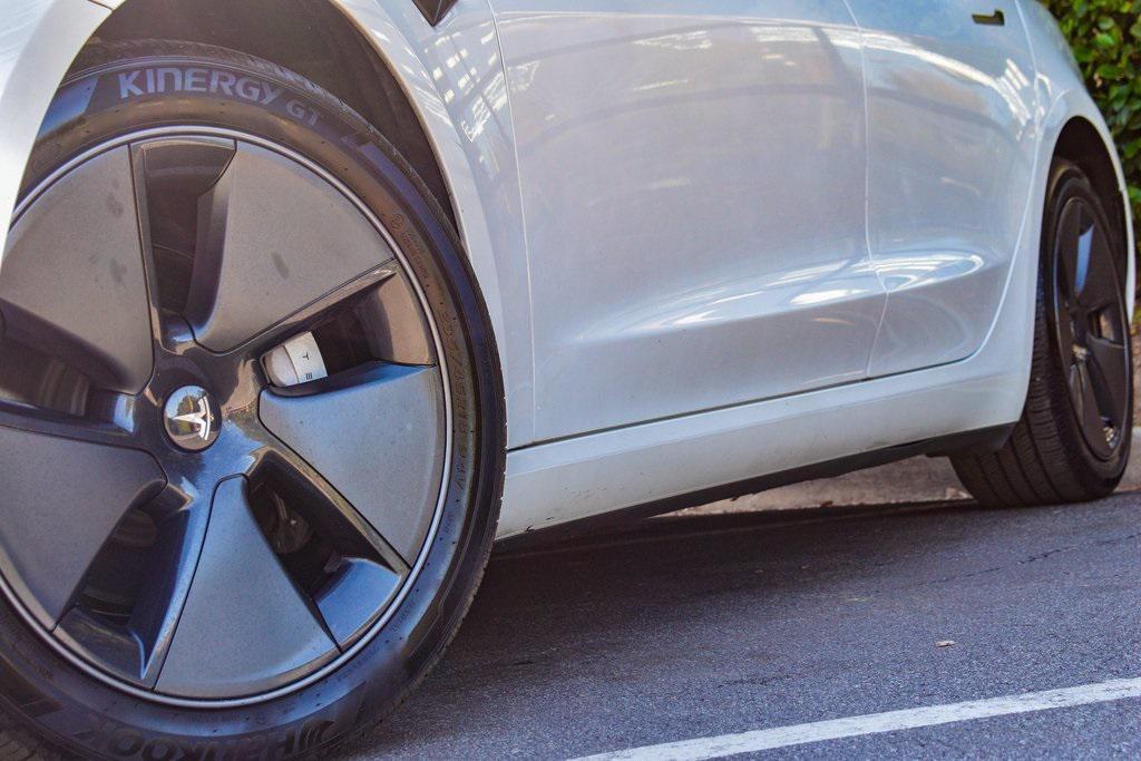 used 2023 Tesla Model 3 car, priced at $24,659