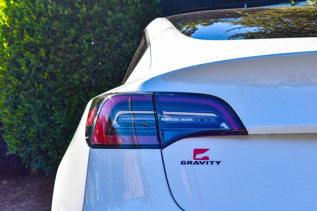 used 2023 Tesla Model 3 car, priced at $24,659