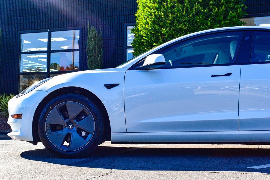 used 2023 Tesla Model 3 car, priced at $24,659