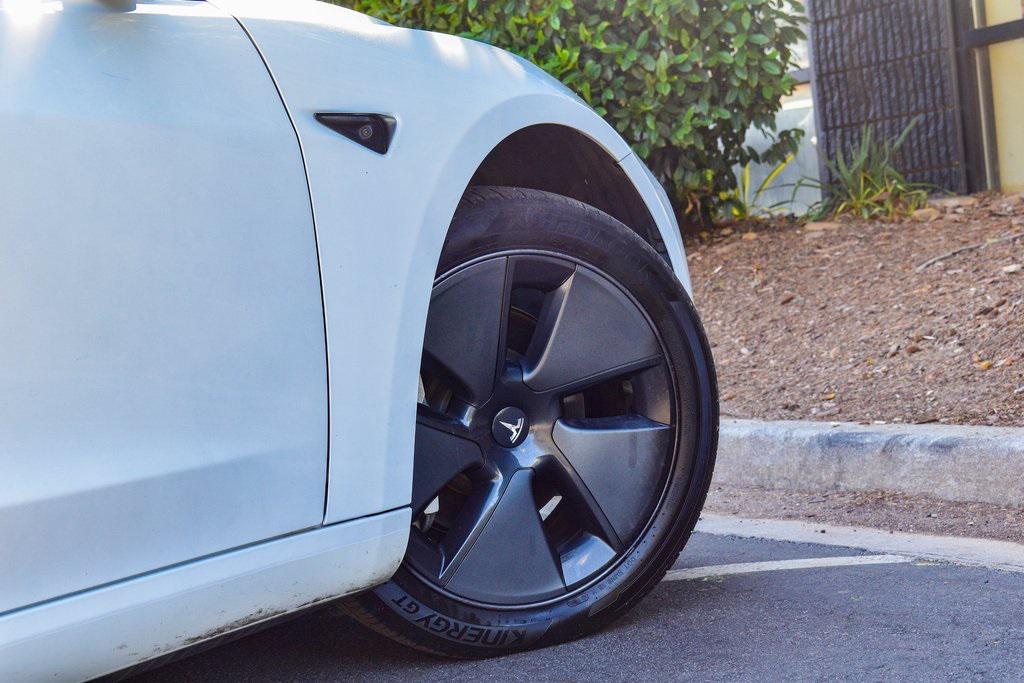 used 2023 Tesla Model 3 car, priced at $24,659