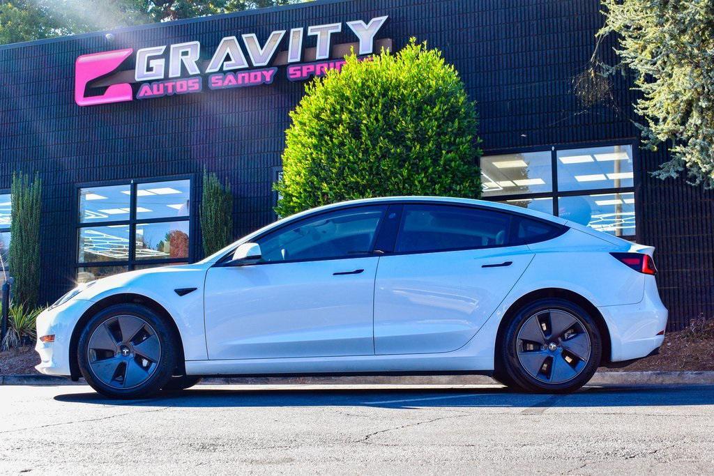 used 2023 Tesla Model 3 car, priced at $24,659
