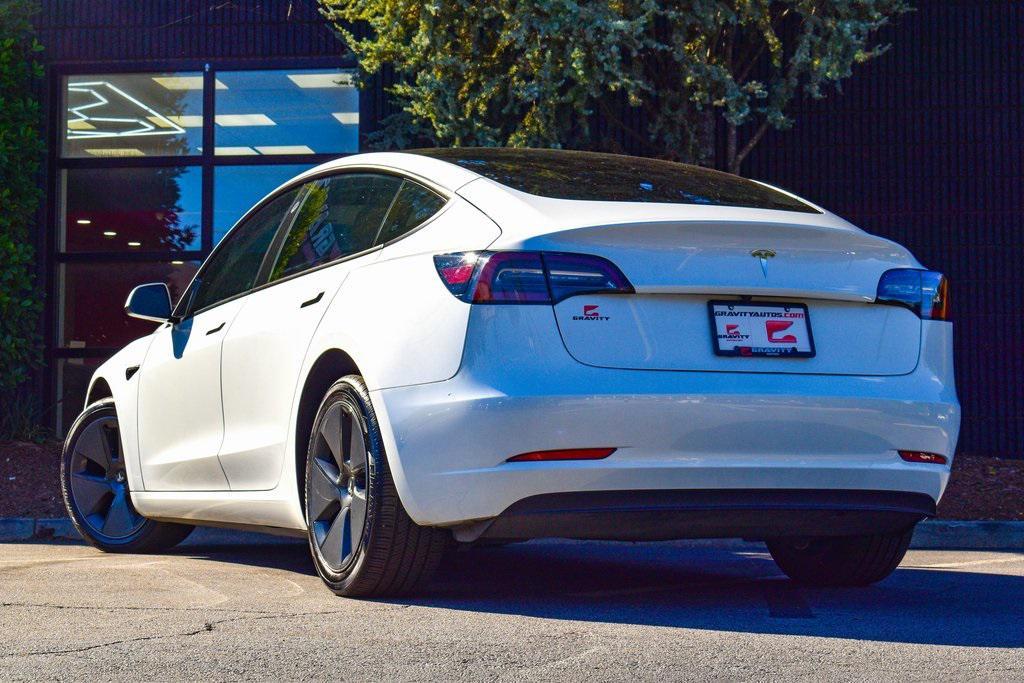 used 2023 Tesla Model 3 car, priced at $24,659