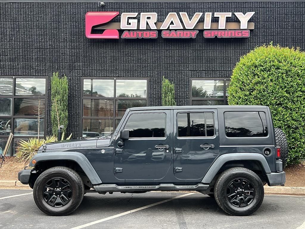 used 2018 Jeep Wrangler JK Unlimited car, priced at $15,495