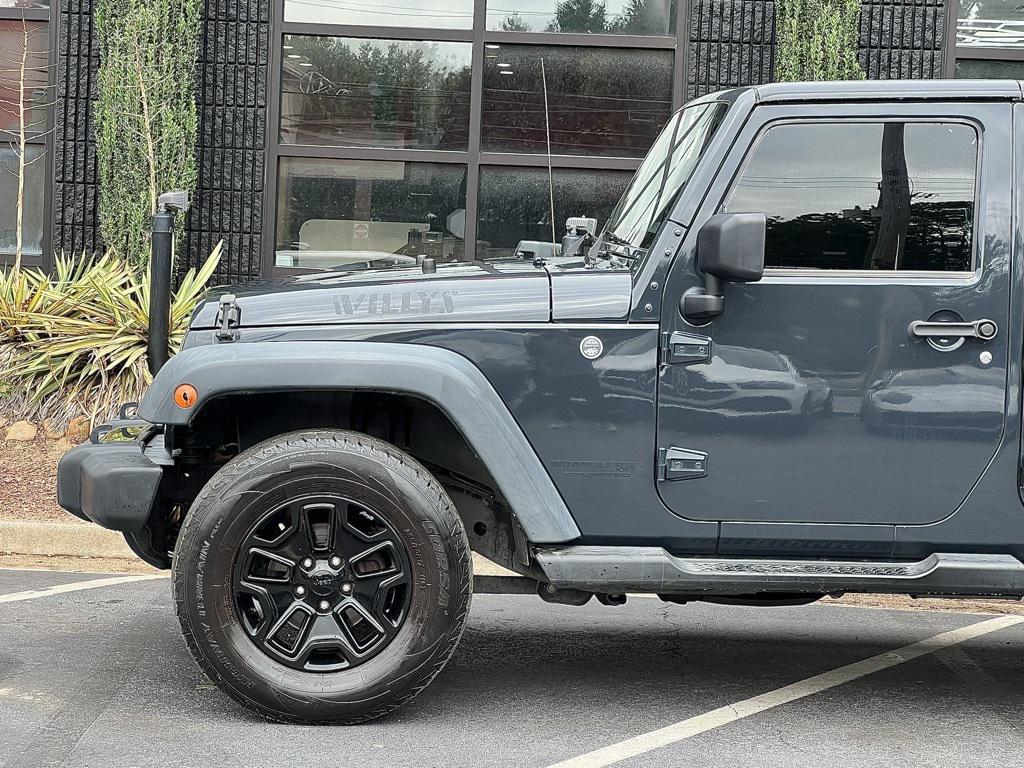 used 2018 Jeep Wrangler JK Unlimited car, priced at $15,495