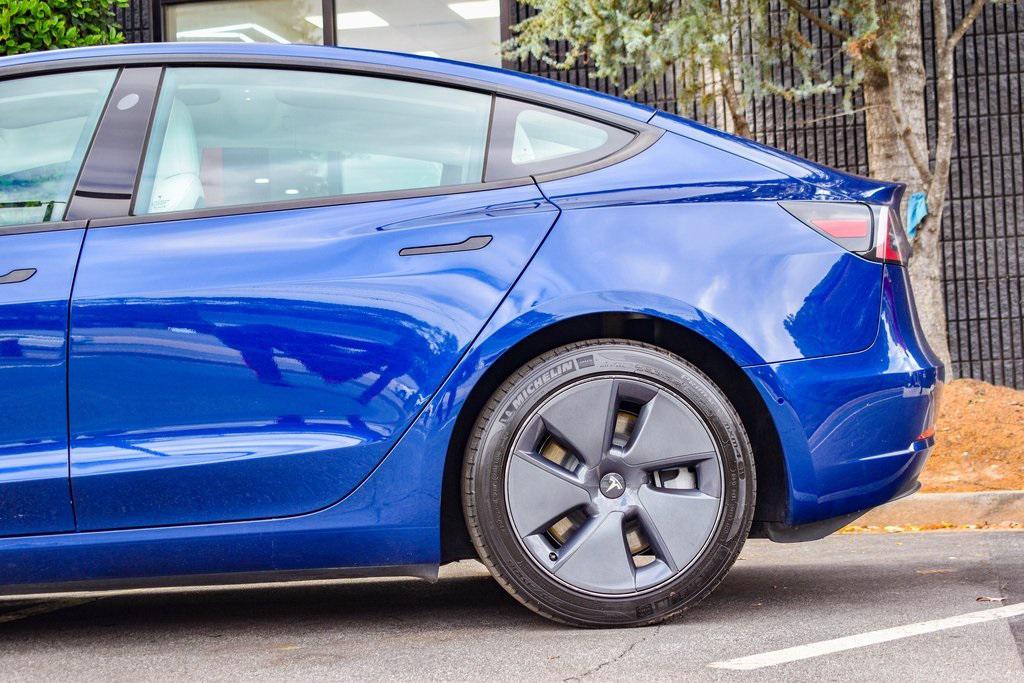 used 2022 Tesla Model 3 car, priced at $26,895