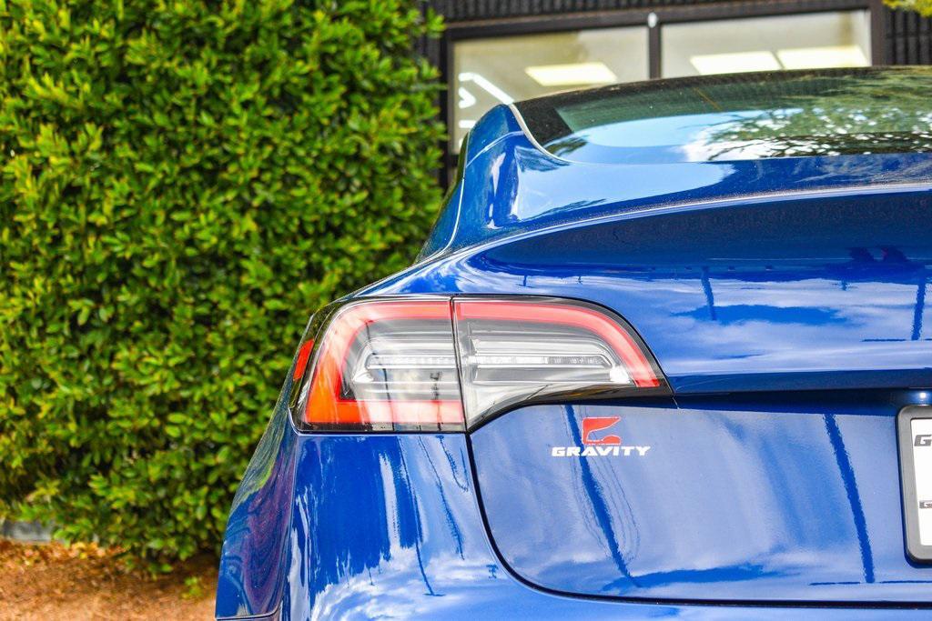 used 2022 Tesla Model 3 car, priced at $26,895