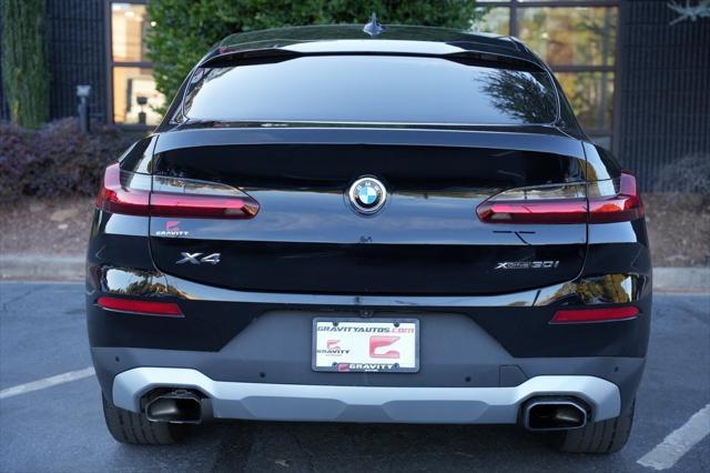 used 2022 BMW X4 car, priced at $36,985