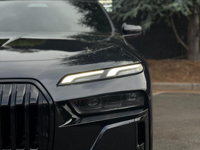 used 2023 BMW 740 car, priced at $64,985