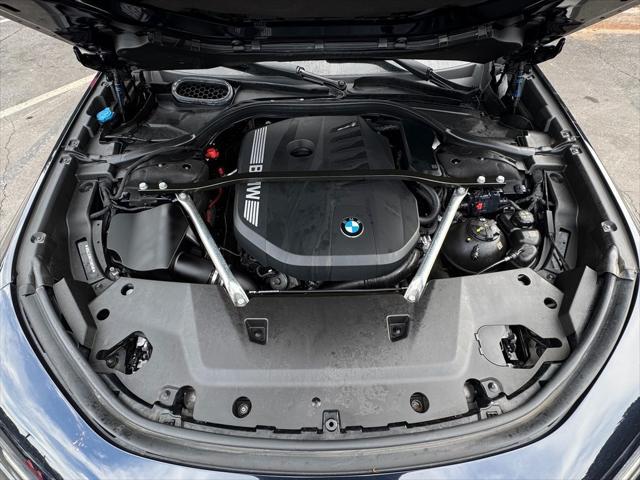 used 2023 BMW 740 car, priced at $64,985