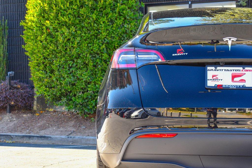 used 2023 Tesla Model Y car, priced at $25,985
