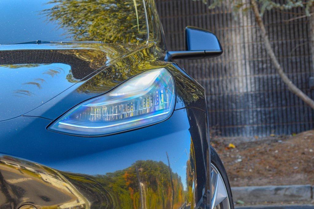 used 2023 Tesla Model Y car, priced at $25,985