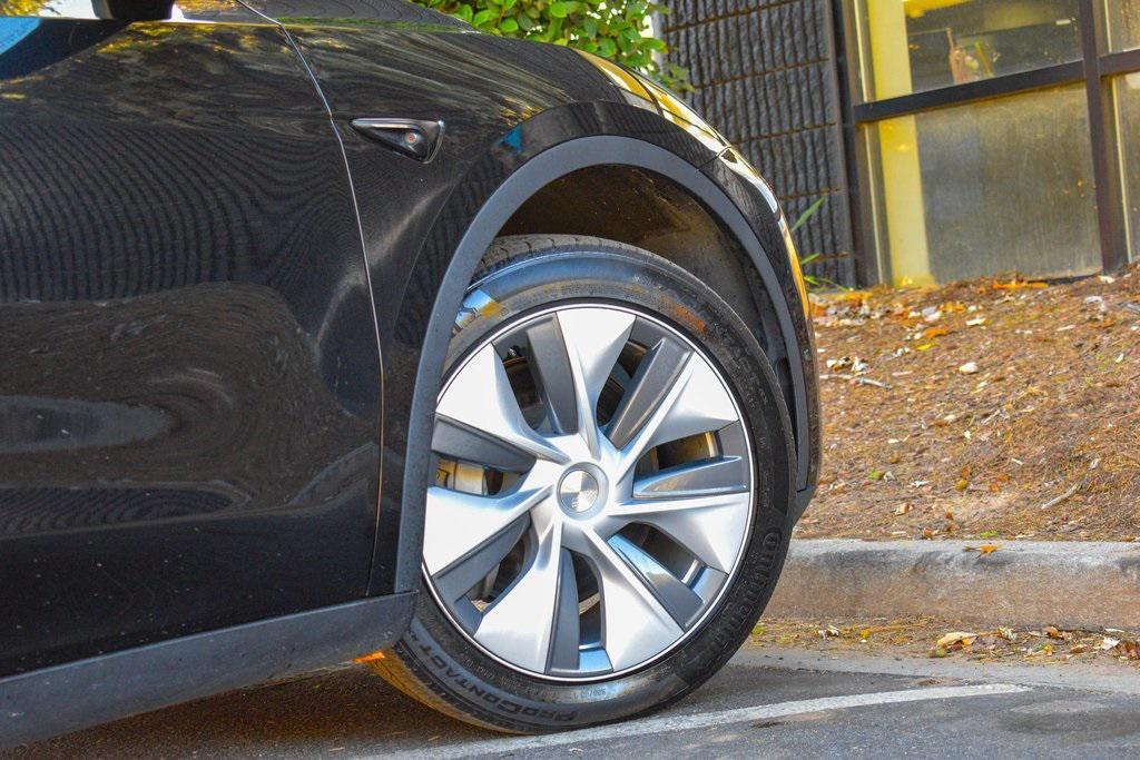 used 2023 Tesla Model Y car, priced at $25,985