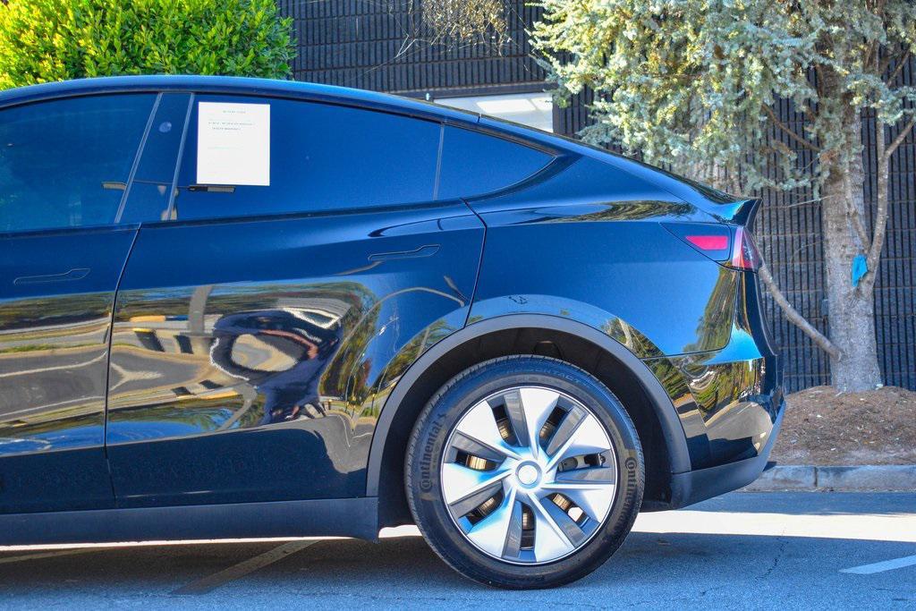 used 2023 Tesla Model Y car, priced at $25,985