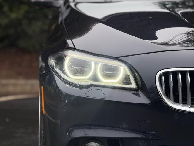 used 2015 BMW 550 car, priced at $16,895