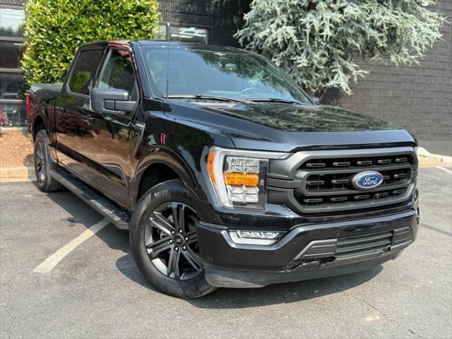 used 2023 Ford F-150 car, priced at $30,395