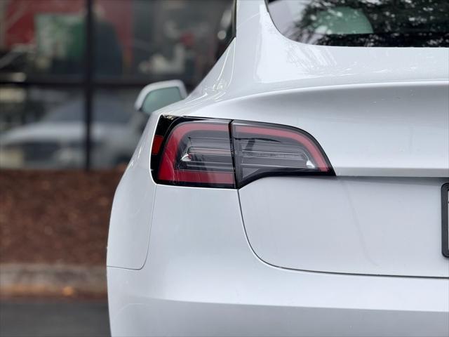 used 2023 Tesla Model 3 car, priced at $25,895