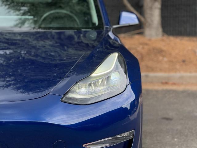 used 2022 Tesla Model 3 car, priced at $28,495