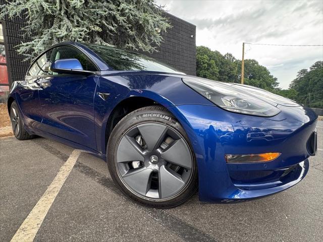 used 2022 Tesla Model 3 car, priced at $28,495