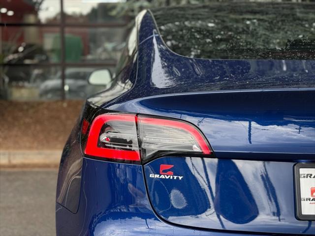 used 2022 Tesla Model 3 car, priced at $28,495