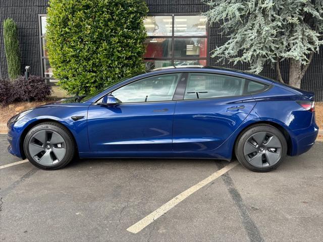 used 2022 Tesla Model 3 car, priced at $28,495