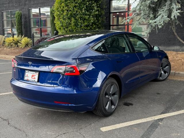 used 2022 Tesla Model 3 car, priced at $28,495