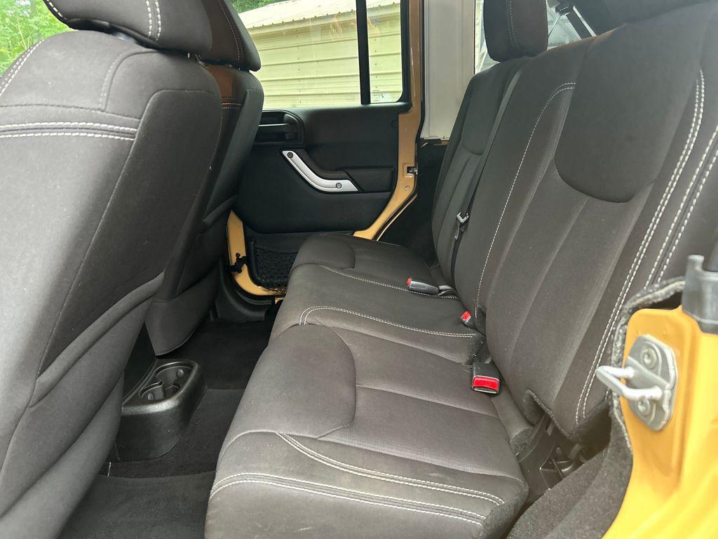 used 2013 Jeep Wrangler Unlimited car, priced at $14,563