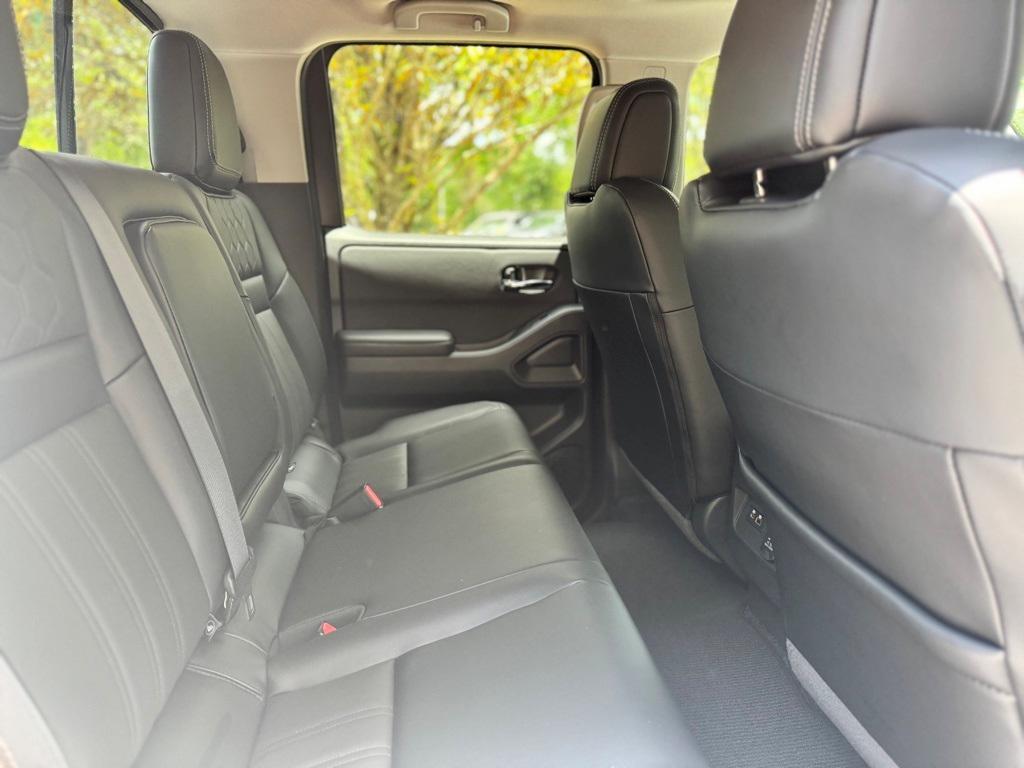 used 2025 Nissan Frontier car, priced at $42,100