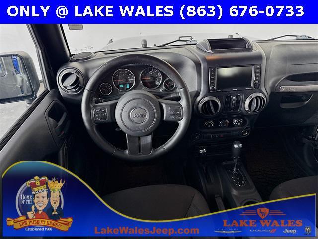 used 2015 Jeep Wrangler Unlimited car, priced at $16,091
