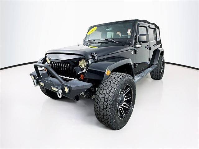 used 2013 Jeep Wrangler Unlimited car, priced at $22,252