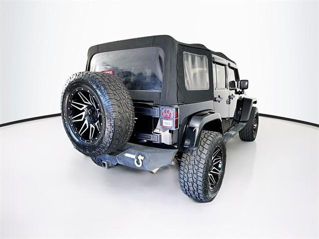 used 2013 Jeep Wrangler Unlimited car, priced at $22,252