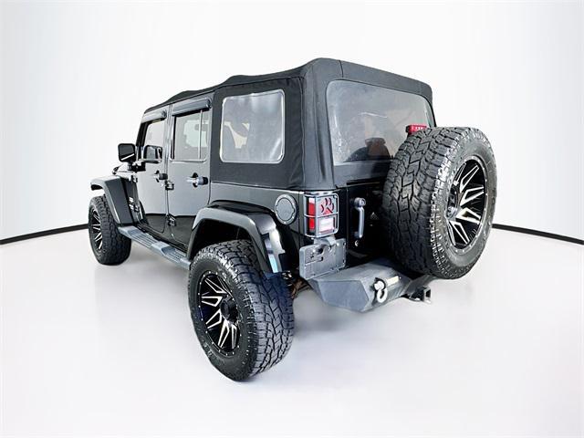 used 2013 Jeep Wrangler Unlimited car, priced at $22,252