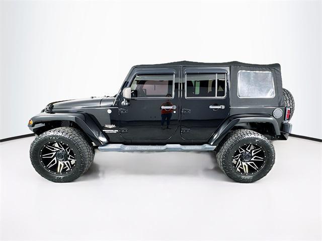 used 2013 Jeep Wrangler Unlimited car, priced at $22,252