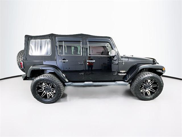 used 2013 Jeep Wrangler Unlimited car, priced at $22,252