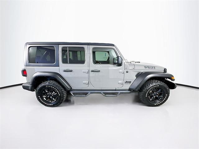 used 2021 Jeep Wrangler car, priced at $32,227