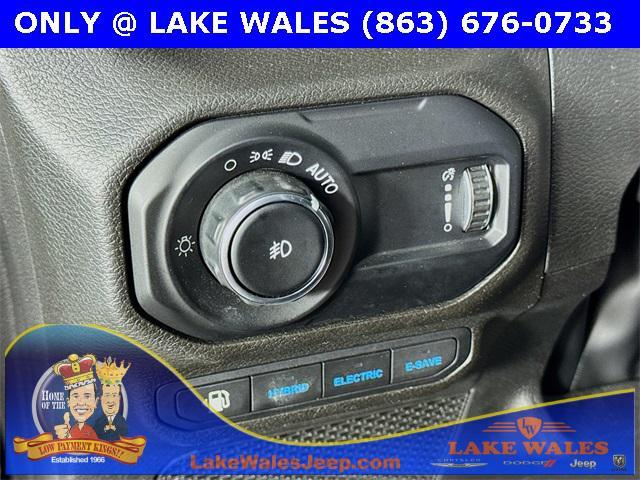 used 2023 Jeep Wrangler 4xe car, priced at $32,859