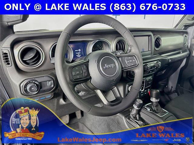 used 2023 Jeep Wrangler 4xe car, priced at $32,859