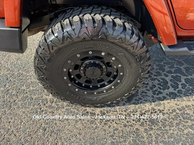 used 2014 Jeep Wrangler Unlimited car, priced at $12,988
