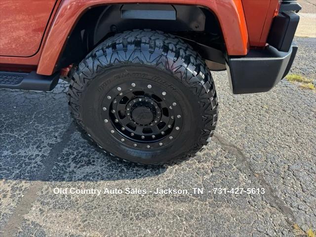 used 2014 Jeep Wrangler Unlimited car, priced at $12,988